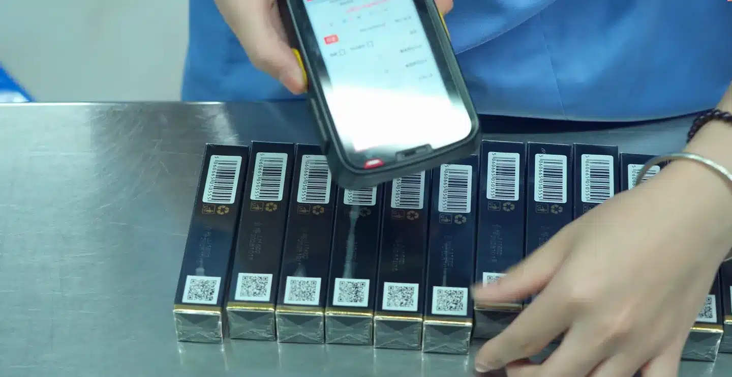 Barcode scanning during cosmetic product traceability inspection