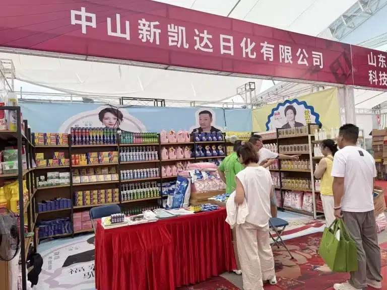 Buyers reviewing household and personal care ranges at a YIFA beauty expo