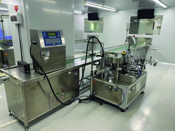 Conveyor equipment with an operator control panel in Kelly Cosmetics materials