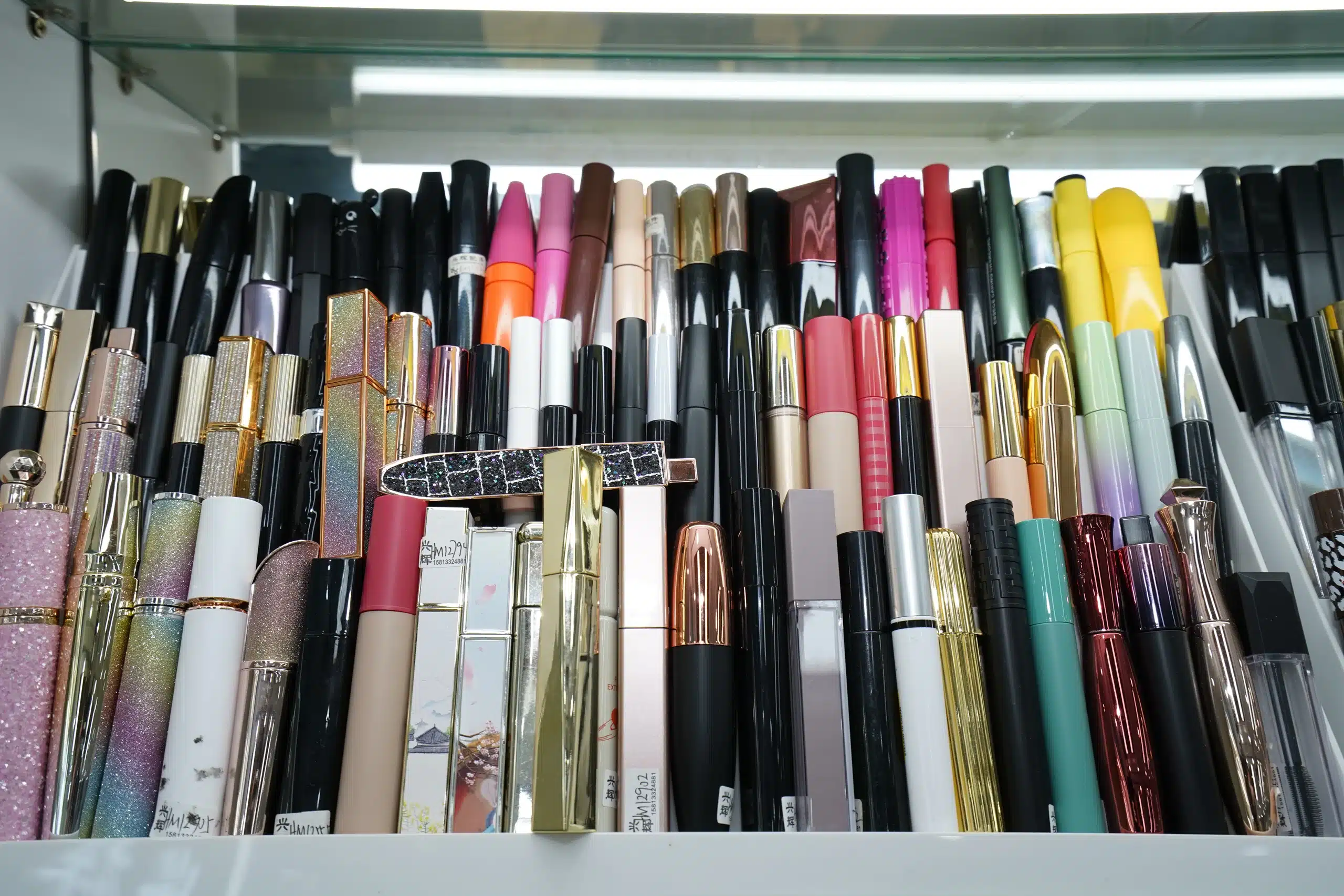 Cosmetic tube packaging samples in different shapes, colours and finishes